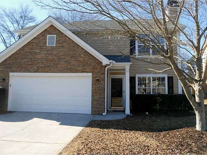 Exterior Front. Sidewalks on a tree lined street l