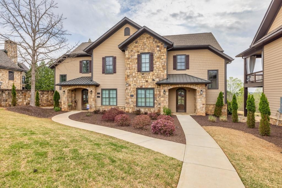 Craftsman inspired home featuring a standing seam 