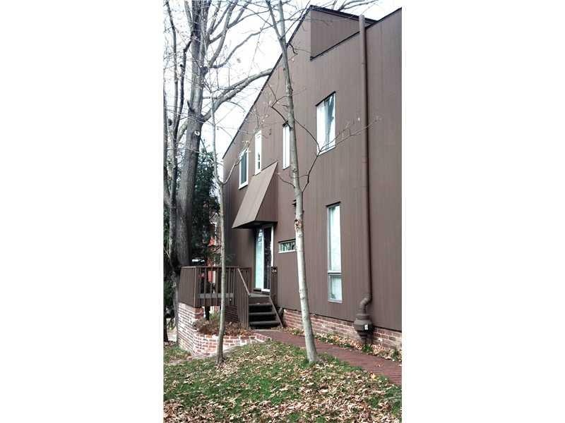 Exterior Front. Side of house and main entrance.