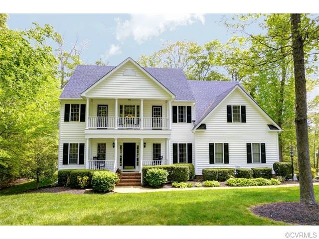 This beautiful home sits on over 1 Acre, bordered 