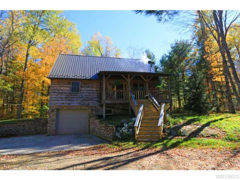 Exterior Front. The home sets back off the road, c