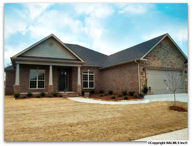The JOYCE Plan @ 5 Nutcracker Lane in Lake Forest. Located minutes from Gate 7, Redstone Arsenal, this home has front entry 4 car garage. Loaded with amenities including granite tops in kitchen and baths, tankless hotwater, full yard sod and sprinkler, ++