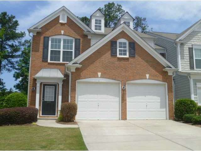 Exterior Front. Rare End Unit