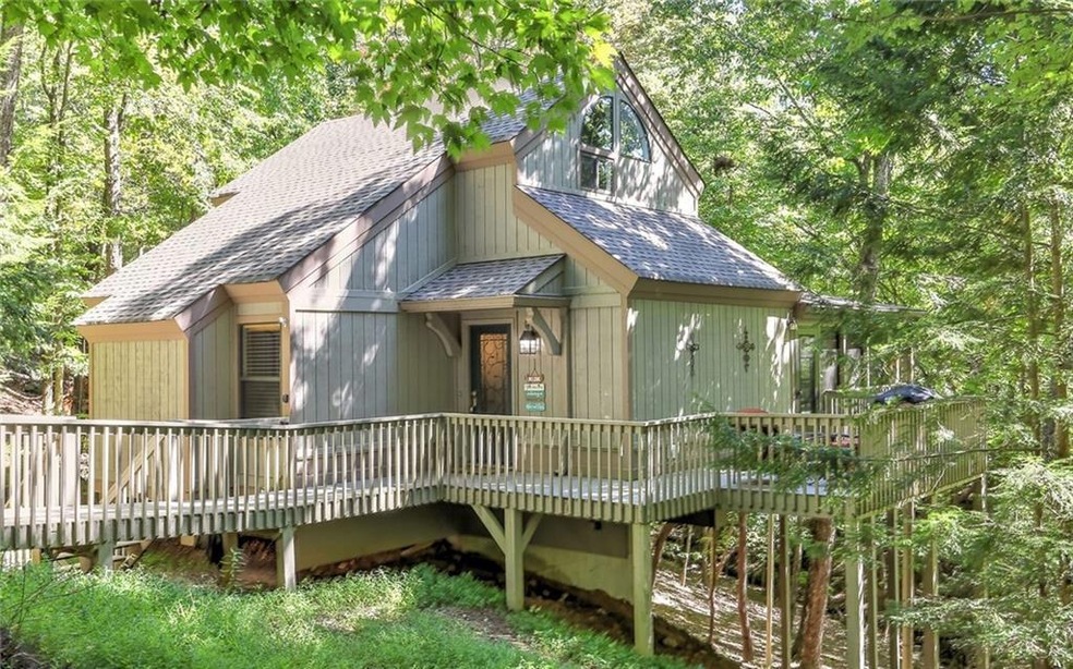 Front of Home with a wooden deck