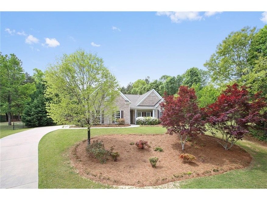 Spacious ranch with side entry garage on 3/4 acre 