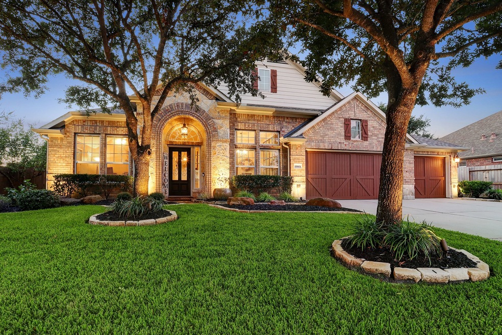 Fantastic curb appeal in this 1.5 story, shows-like-a-model-home property located in a quiet culdesac with neighbors on only ONE side!