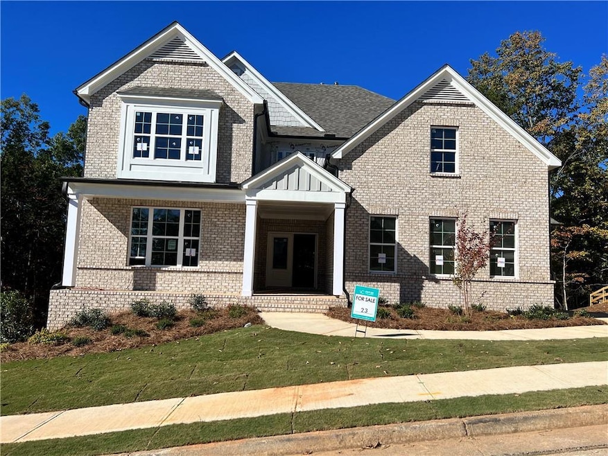 Craftsman-style house with a front yard