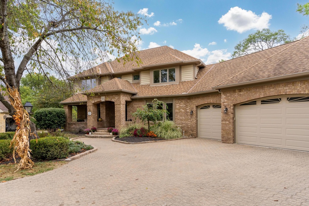 Beautiful paver drive with 3 car garage