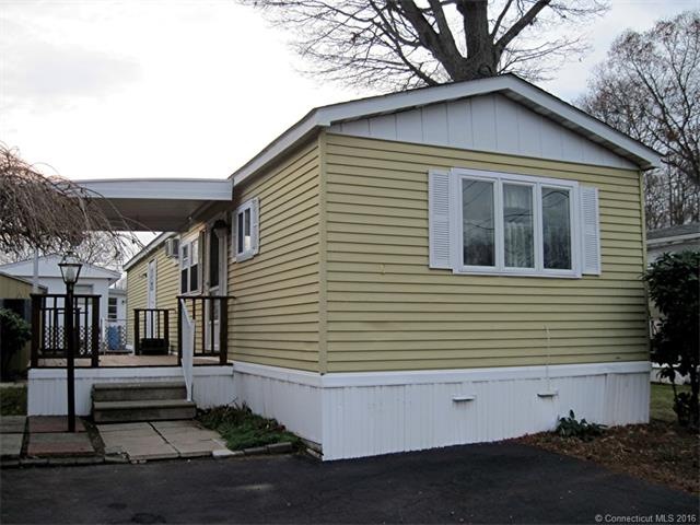 Exterior front with large deck and patio