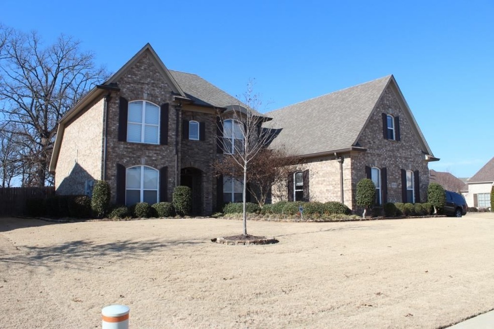 This beautiful home has tile and gorgeous hardwood