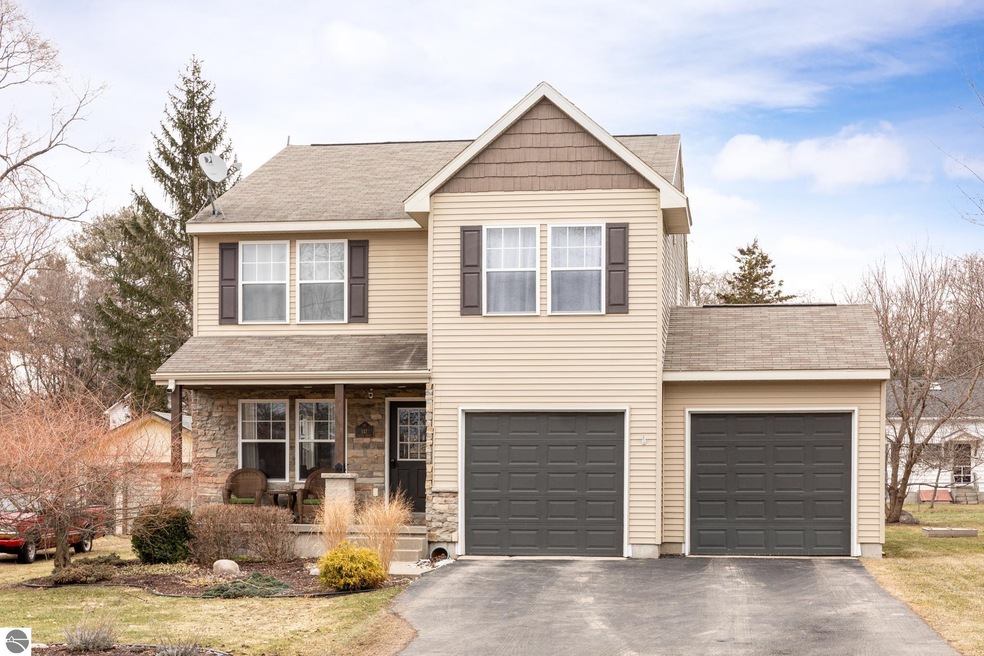 147 Center St, Elk Rapids, MI 49629 - photo 1