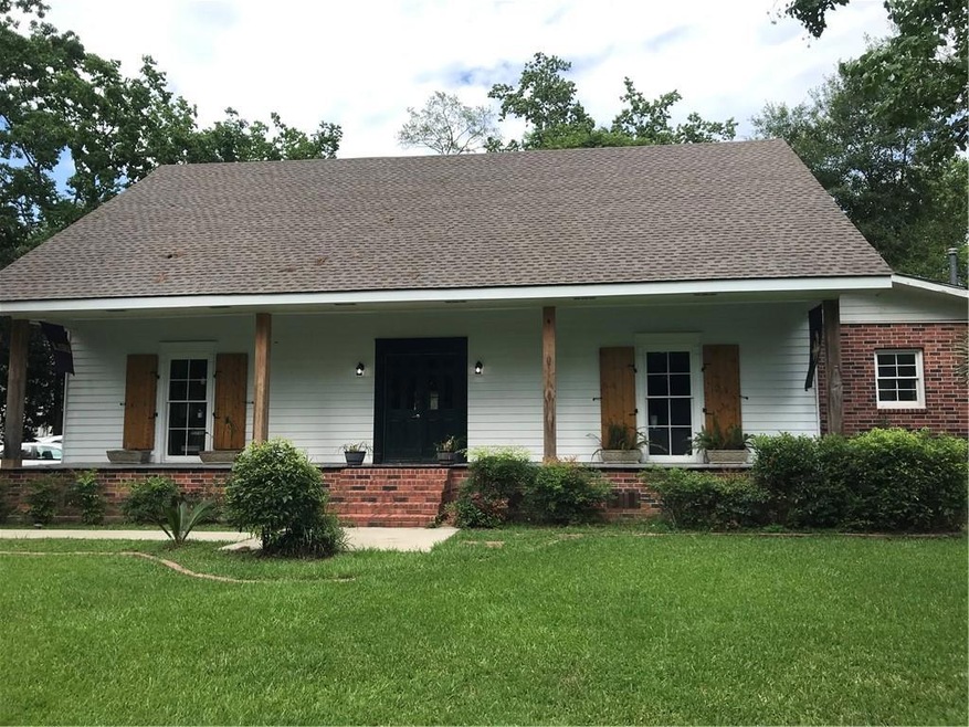 Front of Home with  inviting front porch