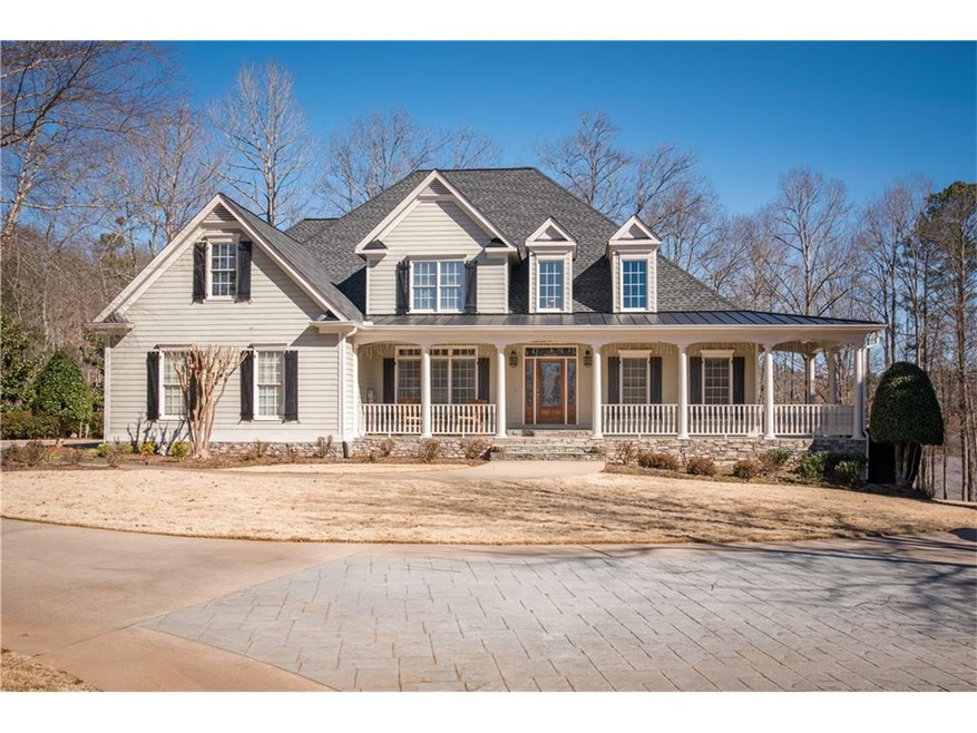 House sits on beautiful Lake Lot over 2.3 Acres.