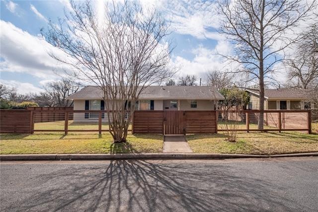 Large corner lot with fully fenced front yard.