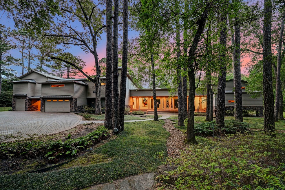 Enjoy the best of both worlds with this architectural masterpiece, nestled in a secluded, wooded oasis, yet minutes away from everything Cypress has to offer.