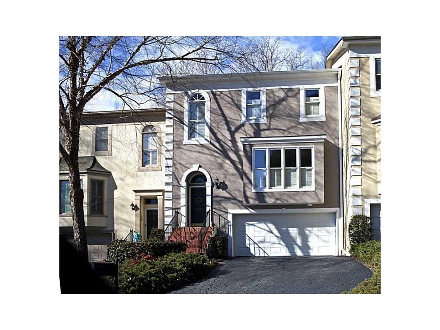 Exterior Front. Cobblestone drive leads to the hom