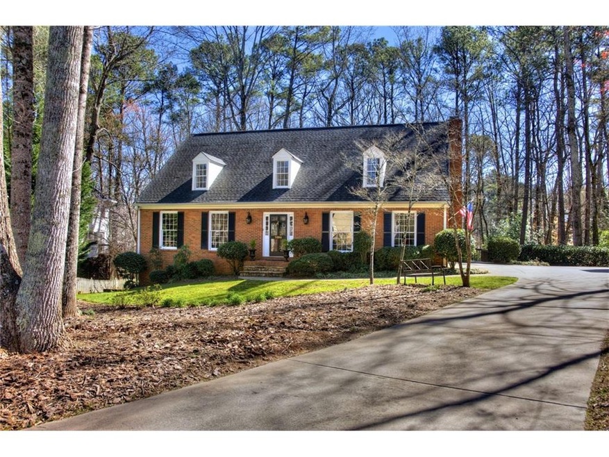 CAPTIVATING FIVE BEDROOM CAPE COD WITH LOVELY YARD