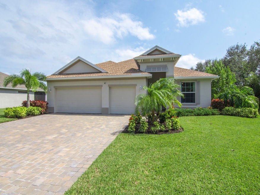 3 CAR GARAGE AND PAVER DRIVEWAY!