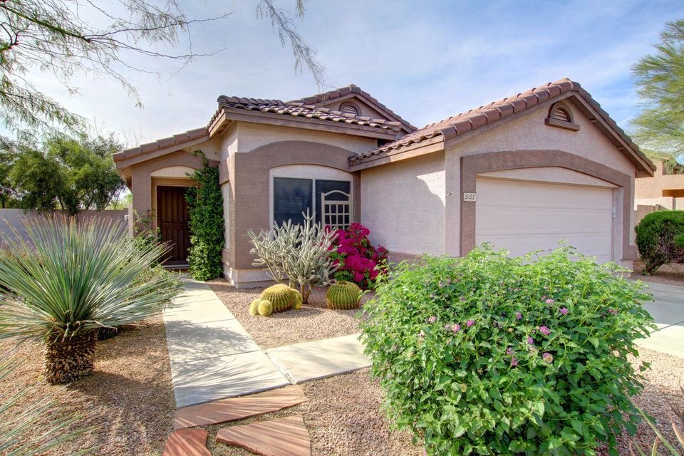 Fabulous curb appeal in Tatum Ranch!