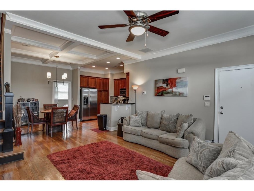 Open floorplan on main with beautiful molding and 