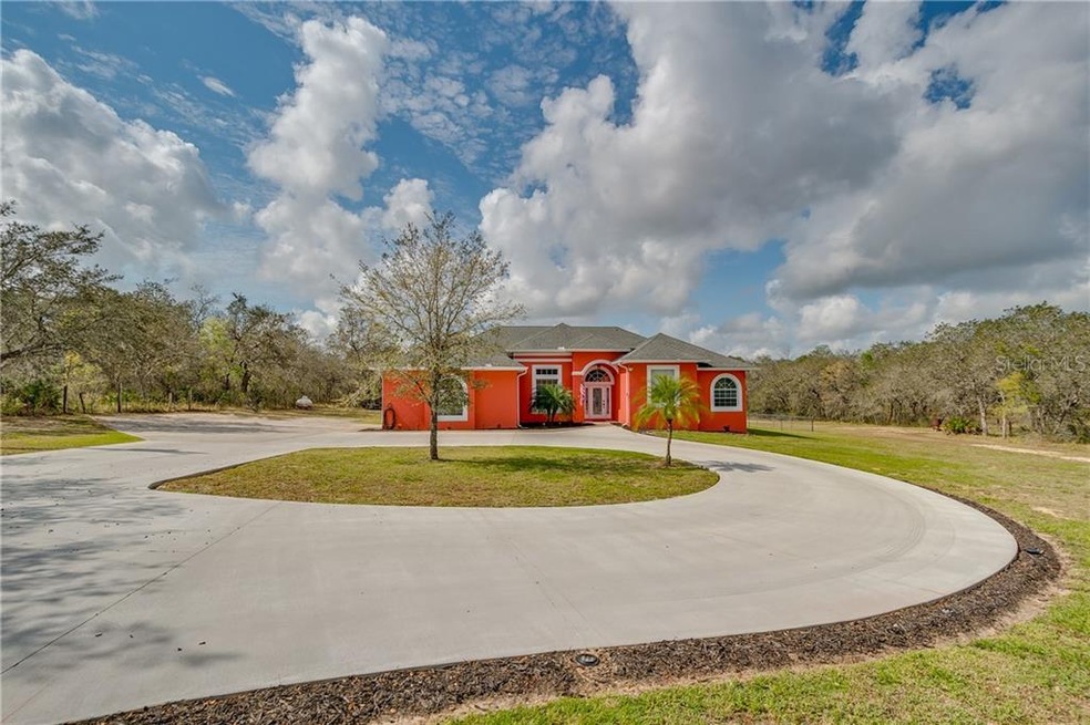 8076 Lake Hatchineha Rd, Haines City, FL 33844 - photo 1