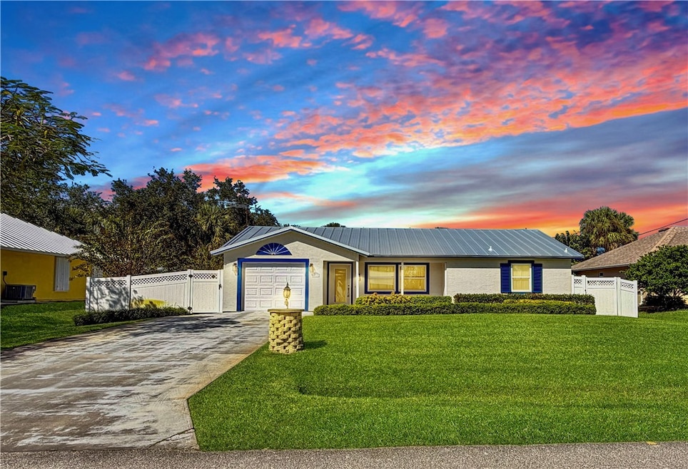 Front of house  at sunset 2Bed 2Bath 1 Car Garage Home with Fenced Yard
