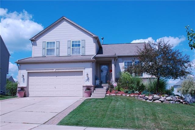 Professionally Landscaped Entrance, exterior light