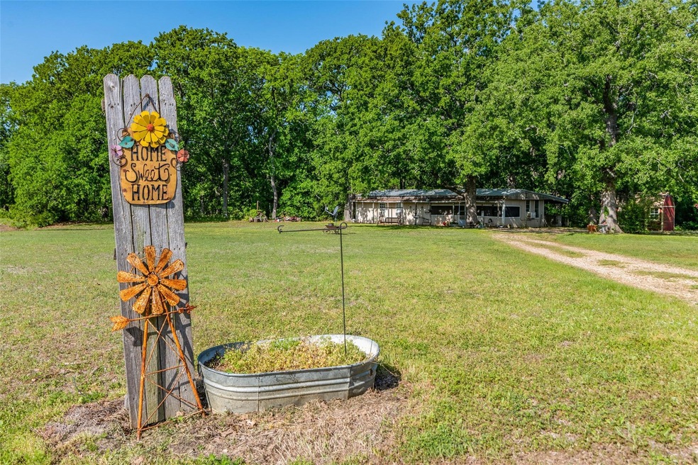 309 Owens Rd, Bells, TX 75414 - photo 1
