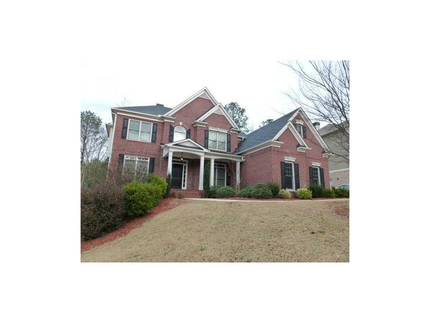 Exterior Front. Brickront with rocking chair porch