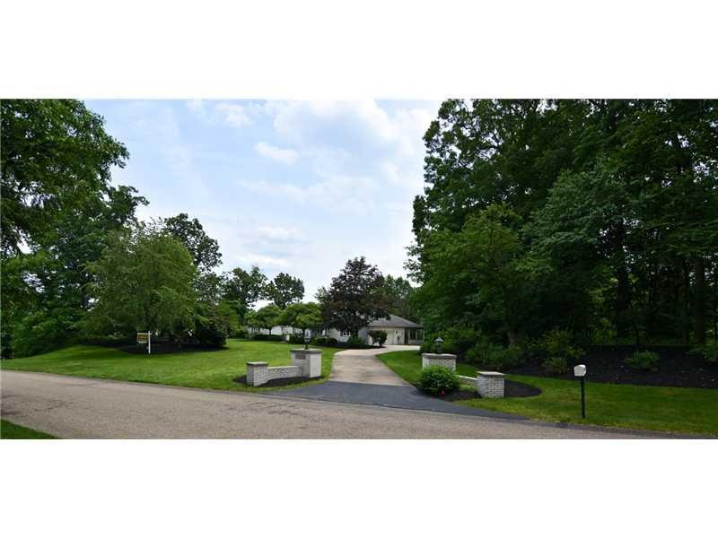 Exterior Front. The home is set far back from the 