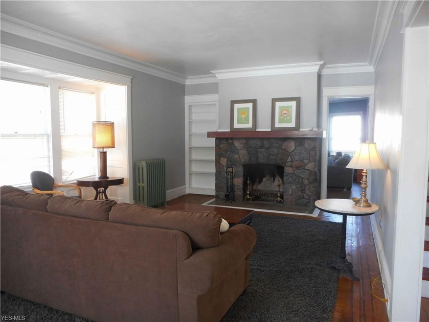 Living Room with Natural Granite Fireplace