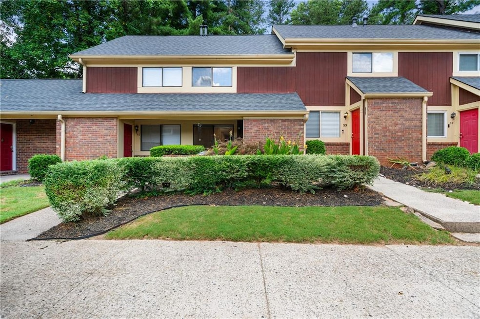Traditional 2-Story home with brick siding.