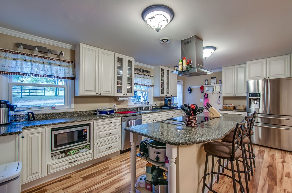 Beautiful kitchen with custom cabinets and quartz countertops