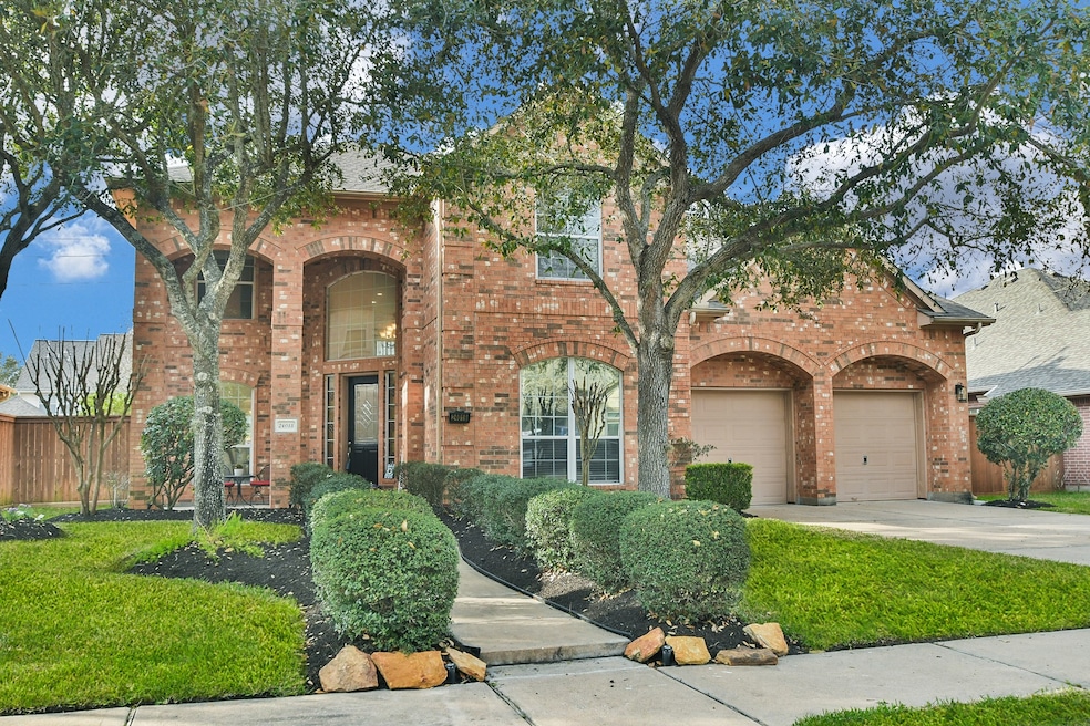 Charming two-story brick home with a welcoming fro