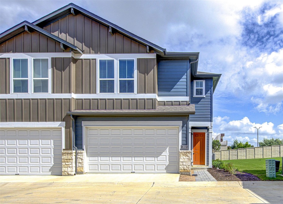 Craftsman inspired home with board and batten sid