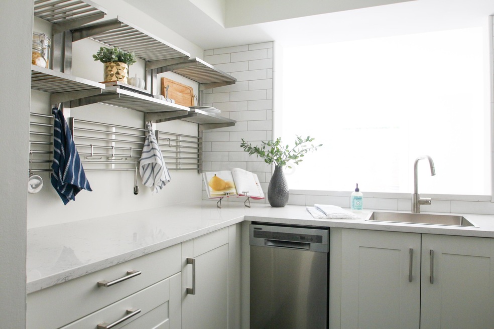 CONDO KITCHEN WITH STAINLESS SHELVING