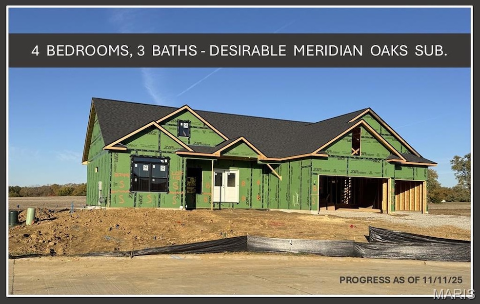 View of front of house with roof with shingles