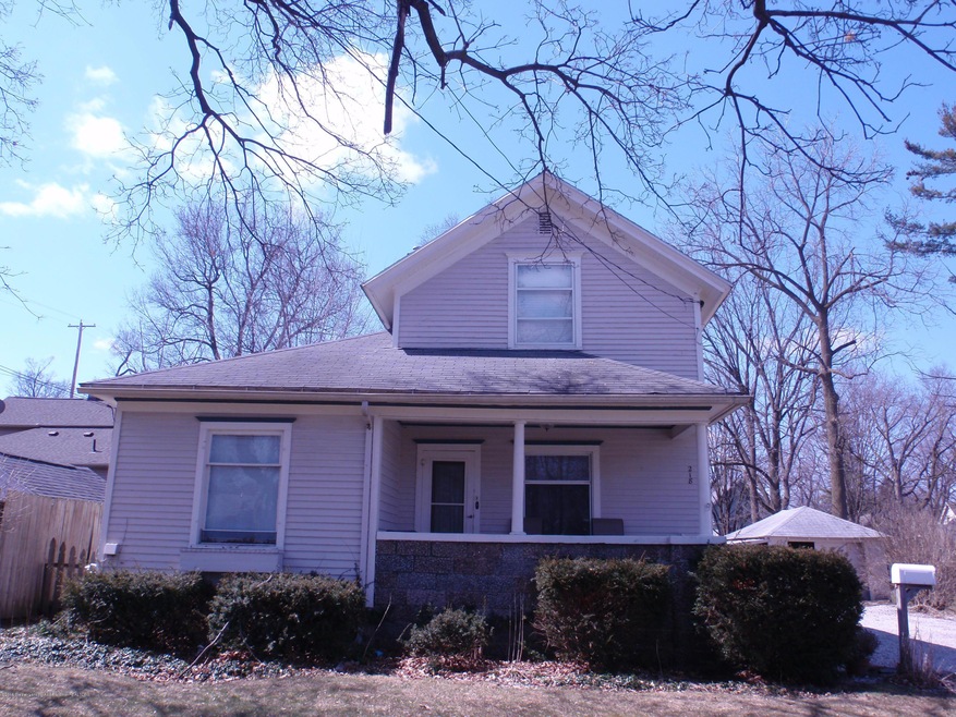 218 Spring St, Grand Ledge, MI 48837 - photo 1