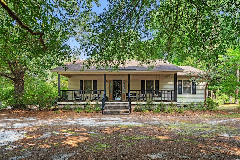 Ranch-style home featuring crawl space, a porch, and a shingled roof