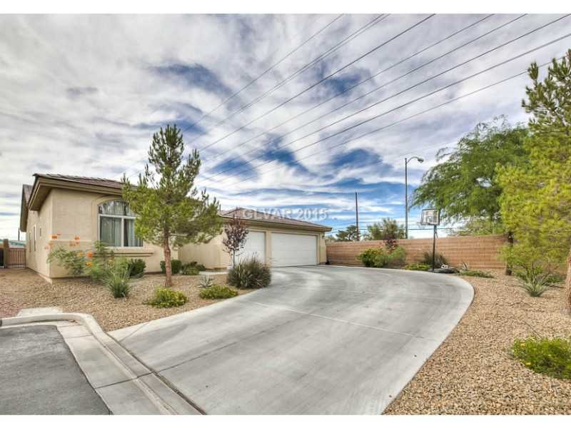 Facade/Exterior Front. Large Driveway