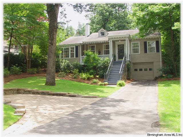 Professionally landscaped yard with a pad for addi
