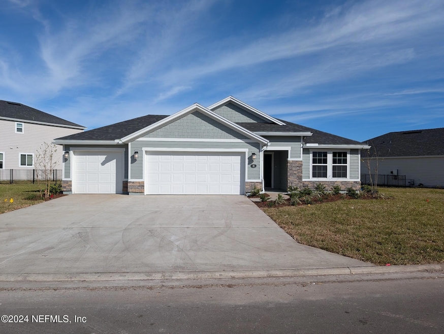 18 Tea Olive Dr, Palm Coast, FL 32137 - photo 1