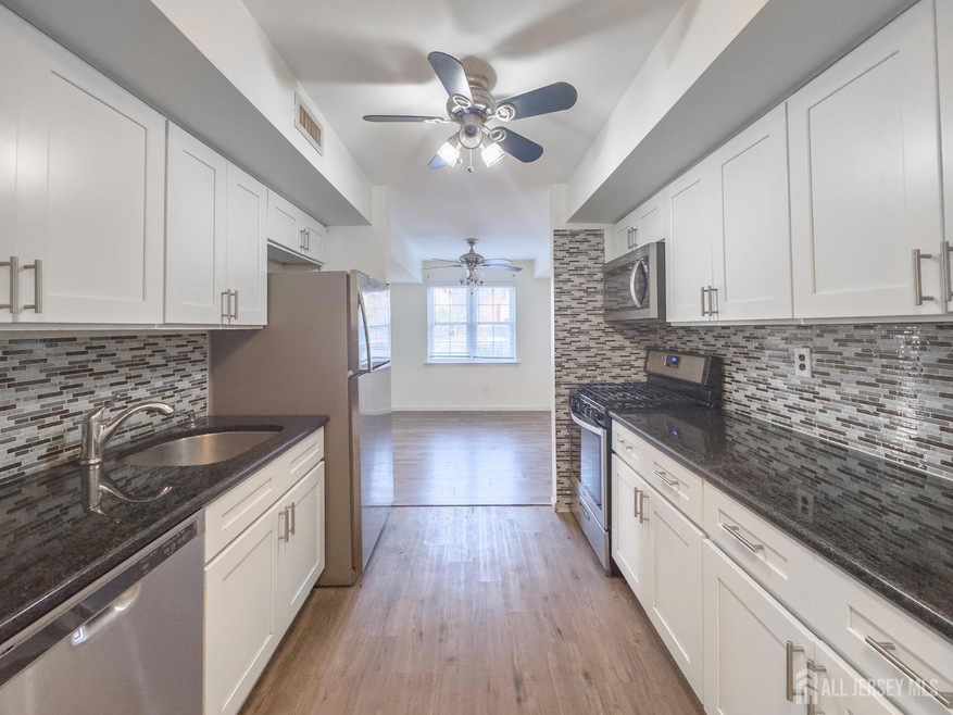 2 Powderhorn Ct unit 21, Woodbridge, NJ 07095 - photo 1