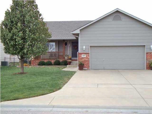 Ranch home with view out basement on lake lot. 244