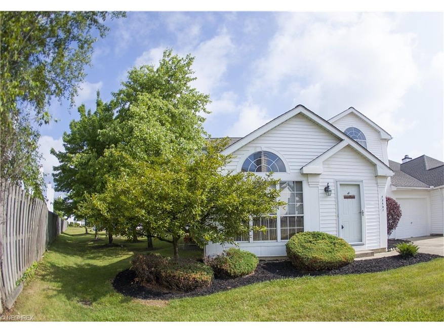 23457 Grist Mill Ct unit 1003, Olmsted Falls, OH 44138 - photo 1