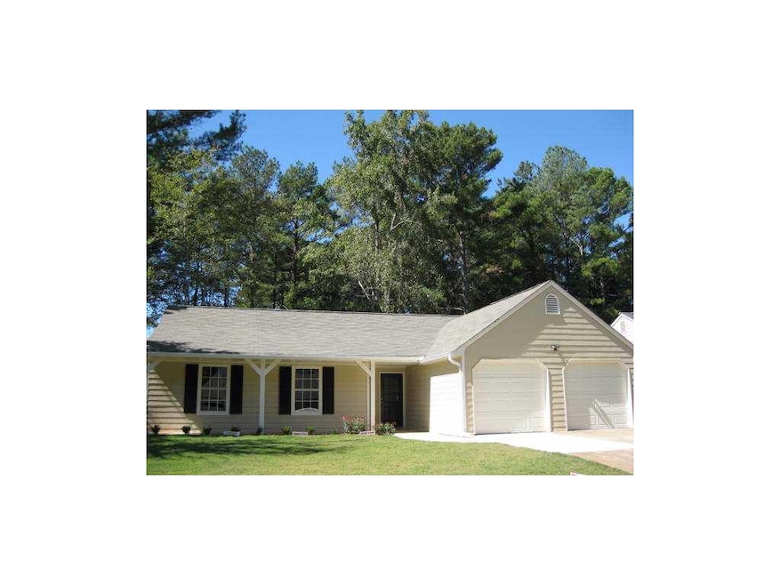 Exterior Front. New roof. Professional landscaped 