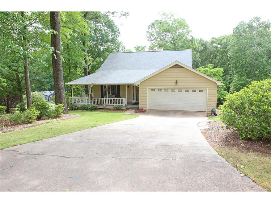 This beautiful home sits on a gorgeous wooded, pri