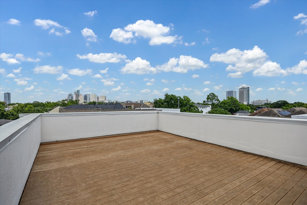 Stunning views! The roof deck features Trex deckin