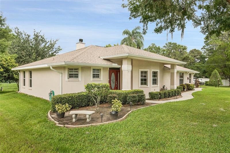 Beautiful block stucco home with brand new roof and transferable 50 year warranty.