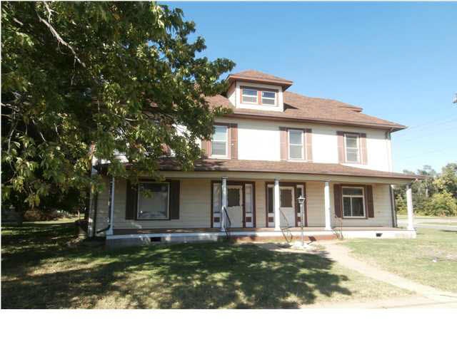 South facing side of house. Large front porch is a